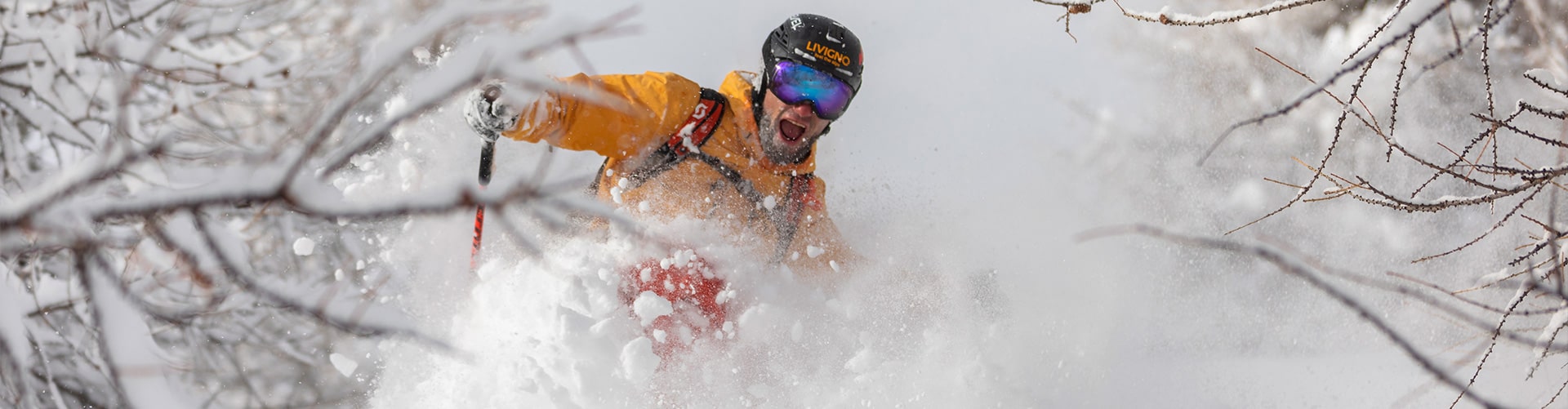 Skier on the Snowy Mountains during his Holiday in Livigno